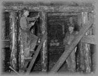 Men in an underground shaft timbering, wpH709